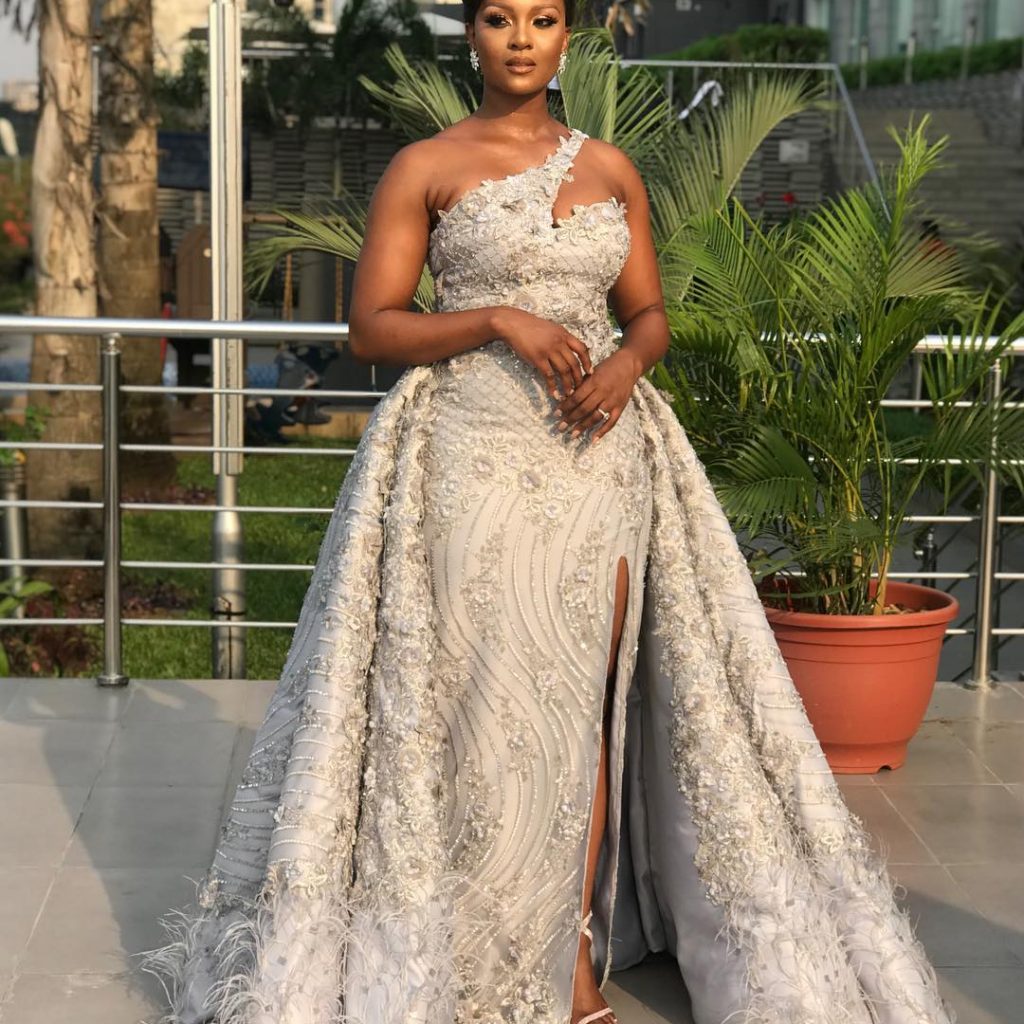Osas Ighodaro Ajibade looks amazing in a silver coloured gown.