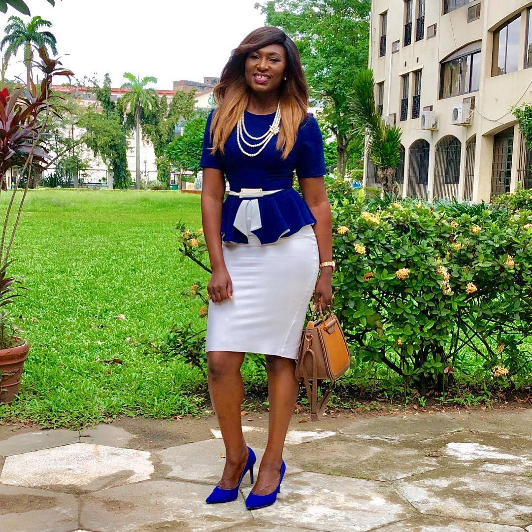 Ufuoma McDermott looks great in her blue and white office wear
