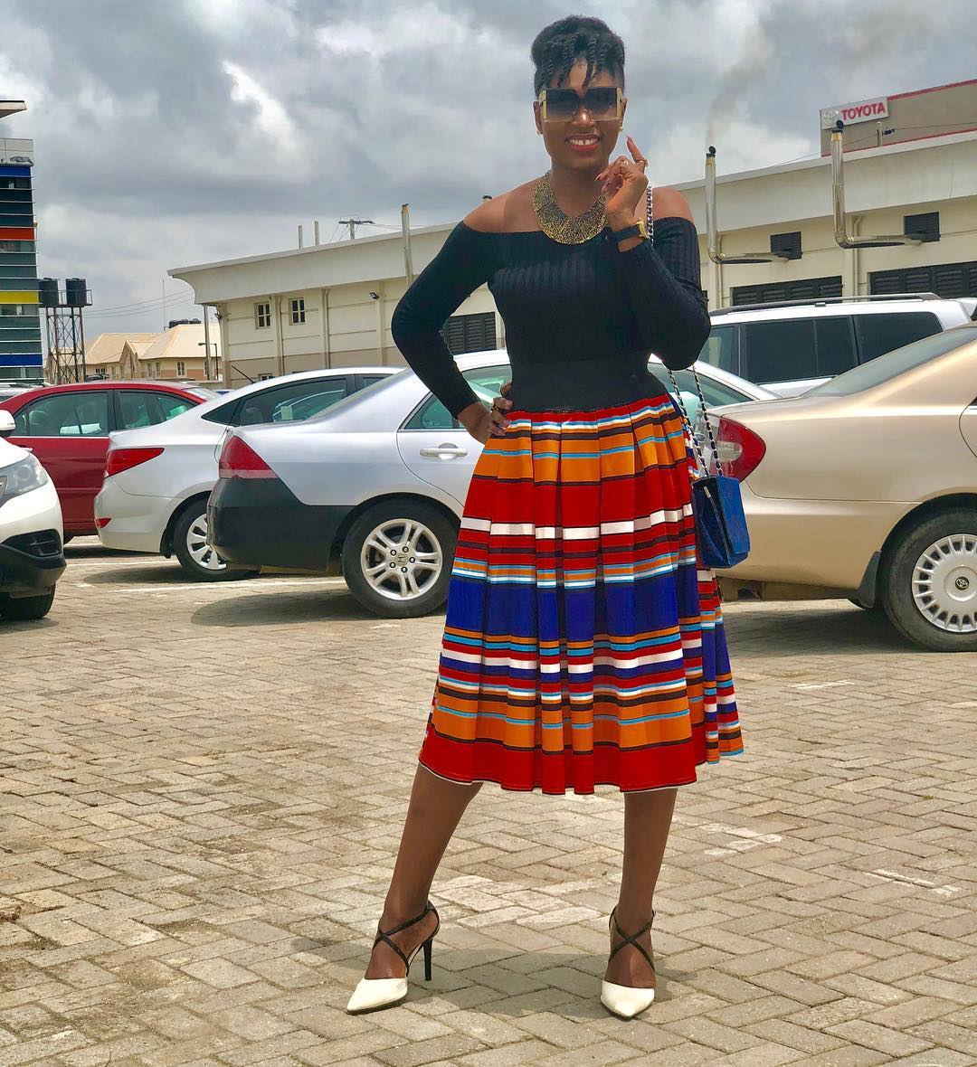 Ufuoma McDermott rocks it in Top and her office skirt 